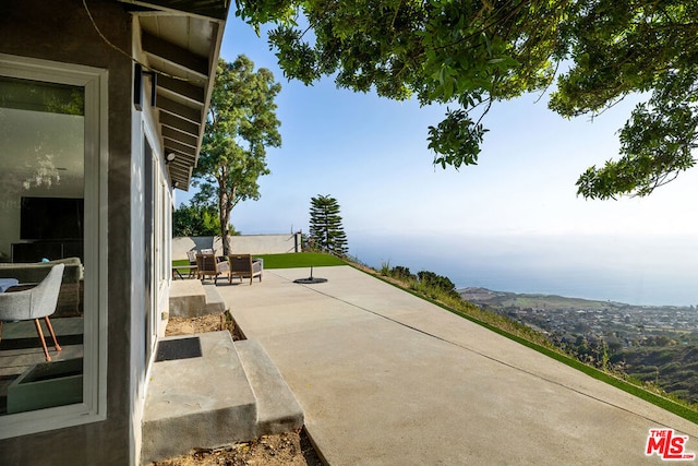 view of patio featuring a mountain view