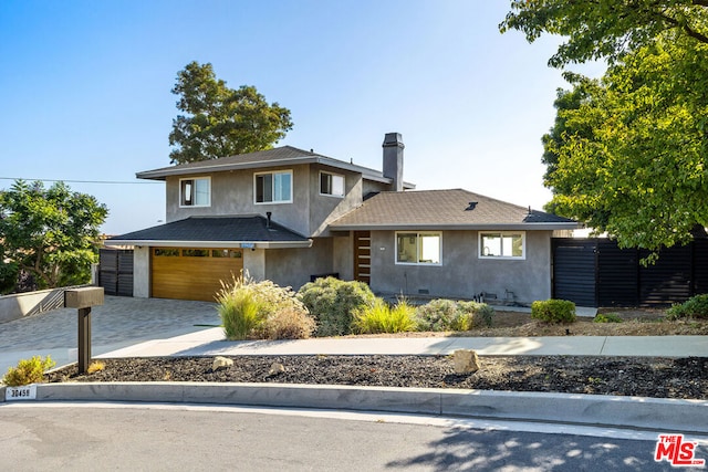 view of front of home featuring a garage