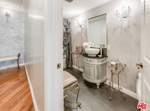 bathroom featuring hardwood / wood-style floors and vanity