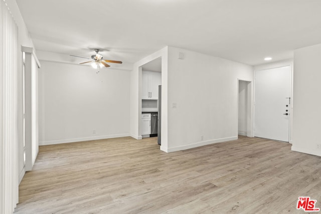 unfurnished living room with ceiling fan and light hardwood / wood-style floors