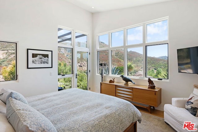 bedroom featuring hardwood / wood-style flooring