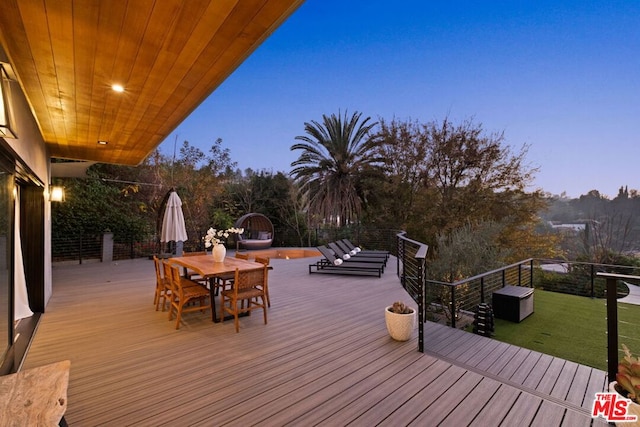 view of deck at dusk