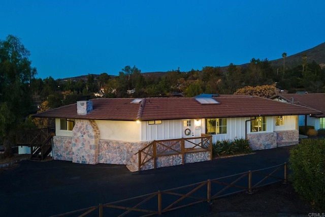 ranch-style house with a mountain view