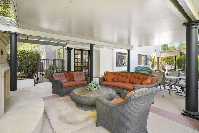 exterior space featuring outdoor lounge area and french doors