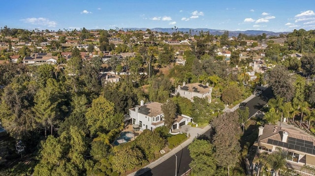 drone / aerial view with a residential view and a mountain view