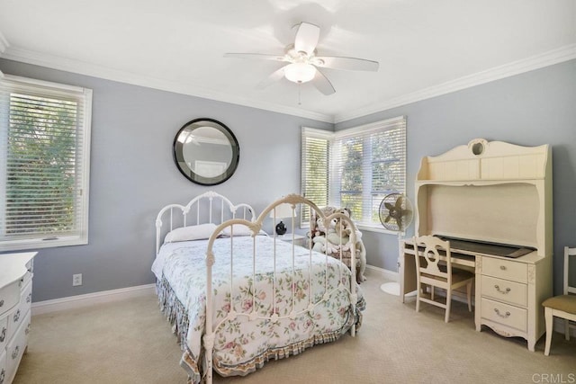 bedroom featuring a ceiling fan, baseboards, light colored carpet, and crown molding