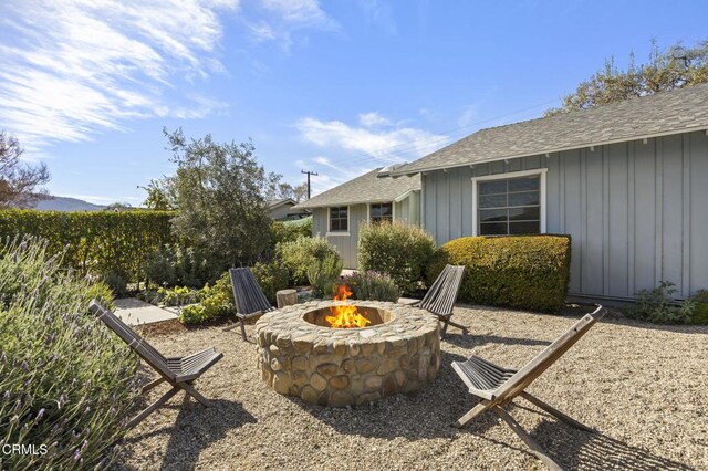 exterior space with a fire pit