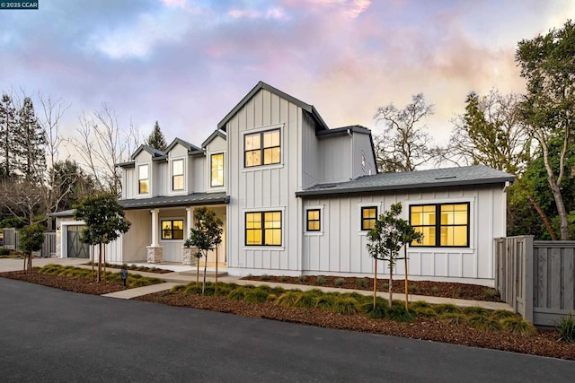 modern farmhouse with a garage