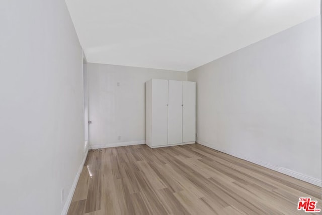 unfurnished bedroom featuring light hardwood / wood-style floors