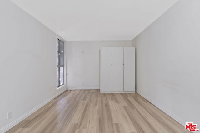 unfurnished bedroom with light hardwood / wood-style flooring