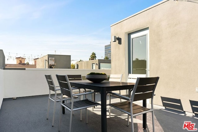 view of patio / terrace featuring a balcony