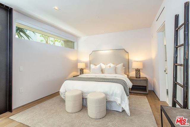 bedroom featuring light hardwood / wood-style flooring