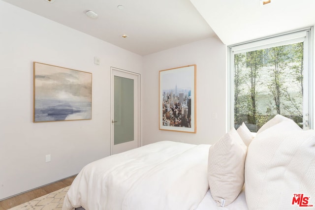 bedroom with light hardwood / wood-style flooring