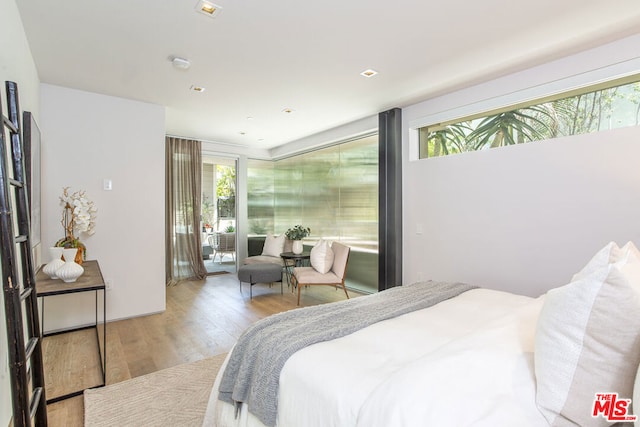 bedroom featuring light wood-type flooring