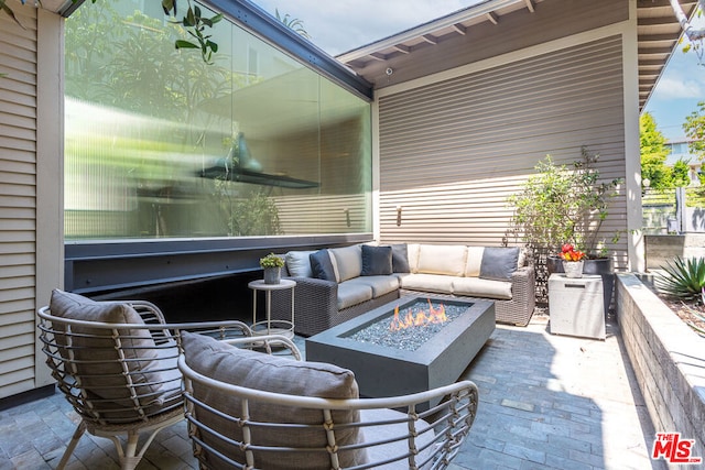 view of patio with an outdoor fire pit