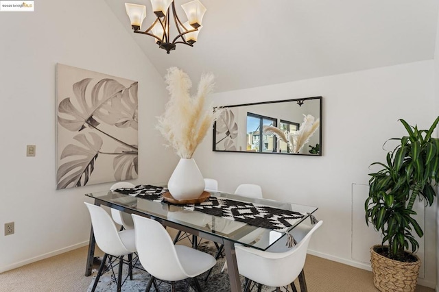 dining space featuring carpet flooring and a notable chandelier