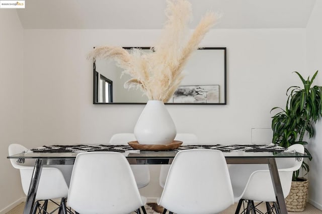 dining area with carpet