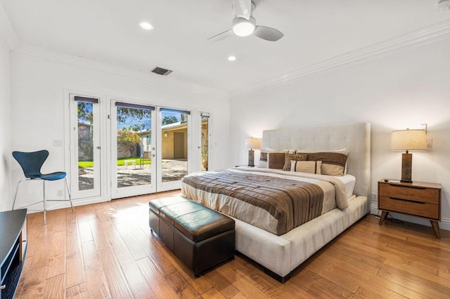 bedroom featuring ceiling fan, hardwood / wood-style floors, ornamental molding, and access to outside