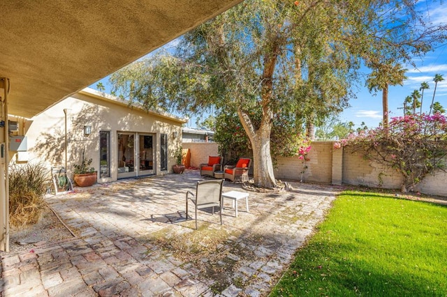 view of yard featuring french doors