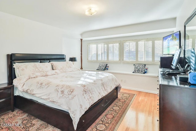 bedroom featuring light wood-type flooring