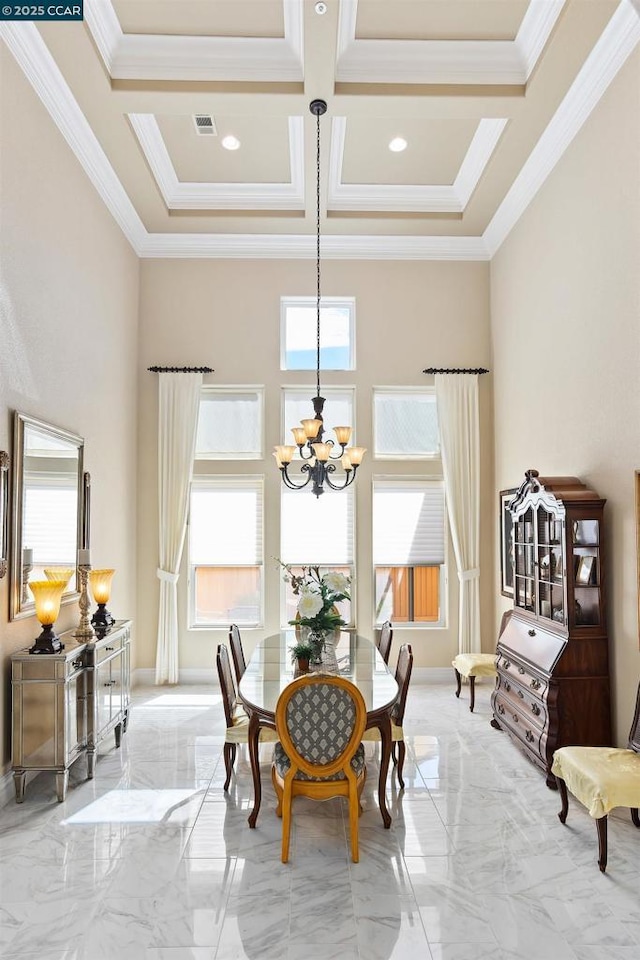 dining room with a chandelier, ornamental molding, beamed ceiling, and coffered ceiling