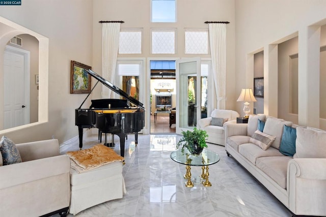 sitting room featuring a high ceiling