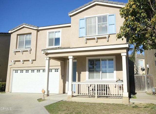 view of front facade with a porch and a garage