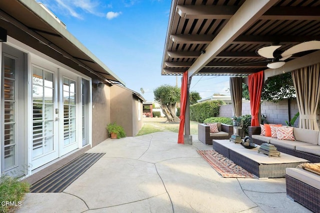 view of patio with ceiling fan, french doors, and an outdoor hangout area