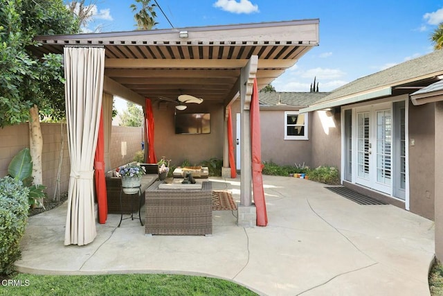 view of patio featuring outdoor lounge area and french doors