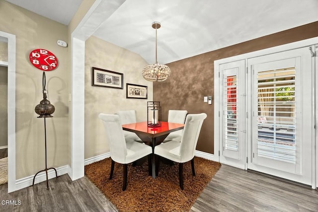 dining space featuring hardwood / wood-style floors