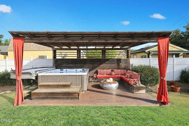 view of patio / terrace with a pergola and a hot tub