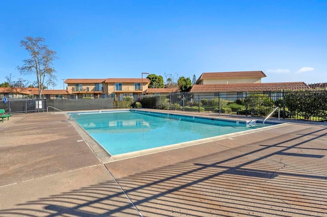 pool featuring fence