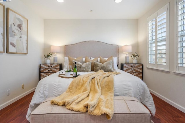 bedroom featuring dark wood-type flooring