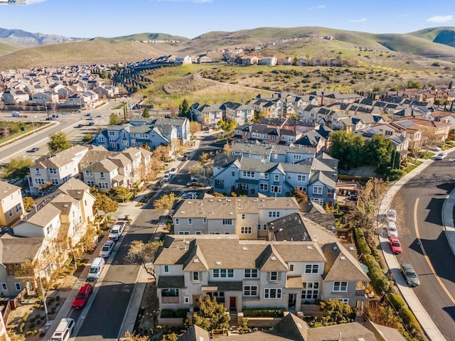 drone / aerial view featuring a mountain view