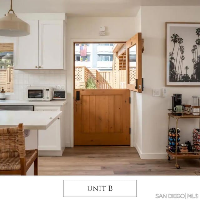 entryway with light wood-type flooring