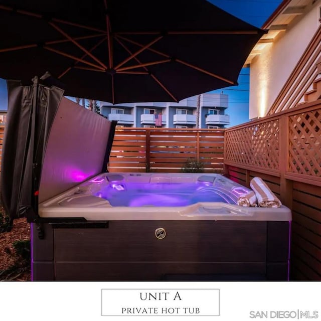 view of patio / terrace featuring a hot tub