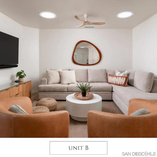 living room with ceiling fan