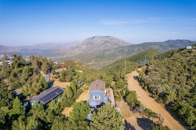 birds eye view of property featuring a mountain view