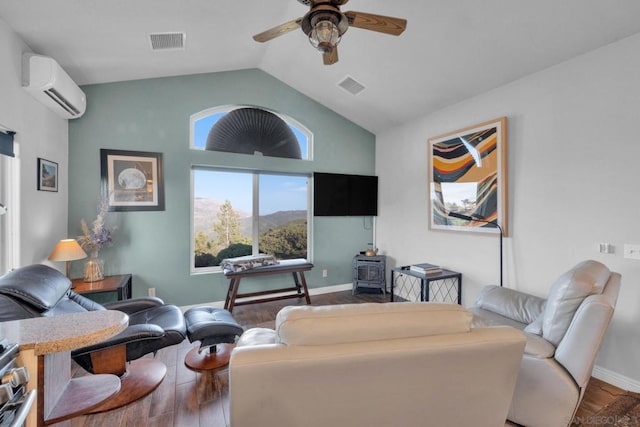 living room featuring ceiling fan, vaulted ceiling, wood-type flooring, and a wall mounted AC