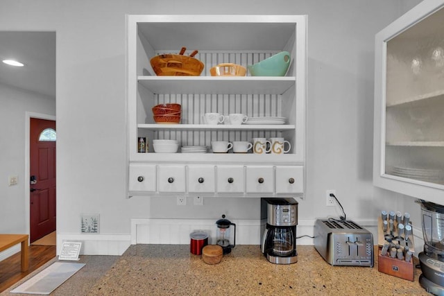 interior space with light stone countertops