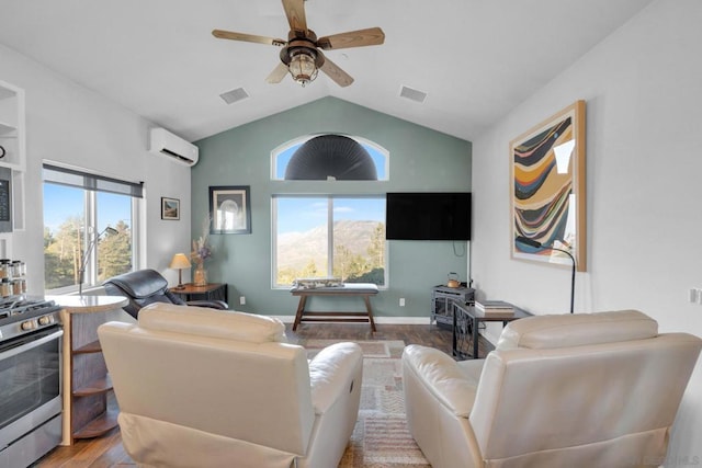 living room with light wood-type flooring, a wall unit AC, ceiling fan, and lofted ceiling