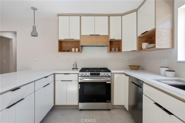 2249 Shoredale Ave, Los Angeles, CA 90031 - kitchen with premium range hood, white cabinetry, pendant lighting, and stainless steel appliances