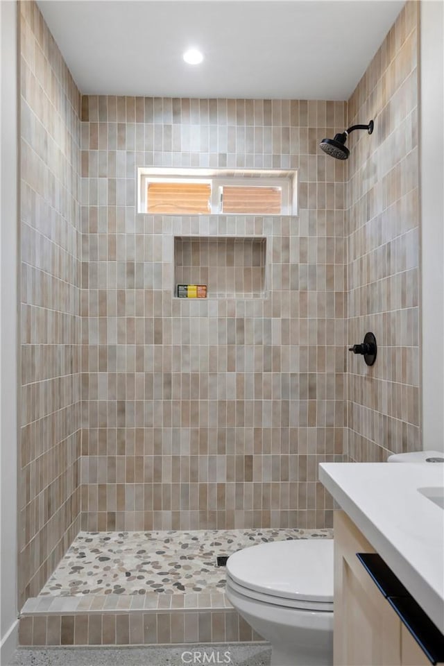 2249 Shoredale Ave, Los Angeles, CA 90031 - bathroom featuring vanity, toilet, and a tile shower