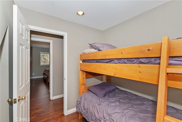 bedroom featuring dark hardwood / wood-style flooring