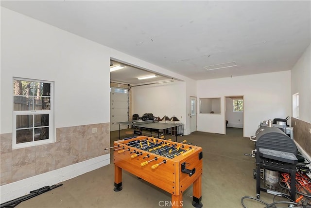 playroom featuring concrete floors