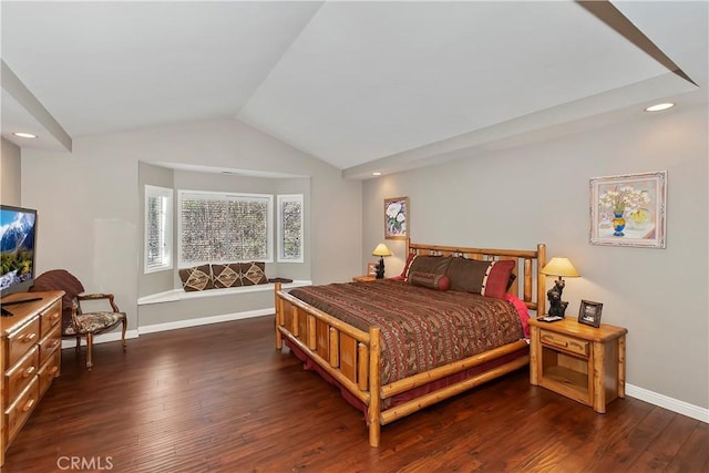 bedroom featuring dark hardwood / wood-style flooring and vaulted ceiling