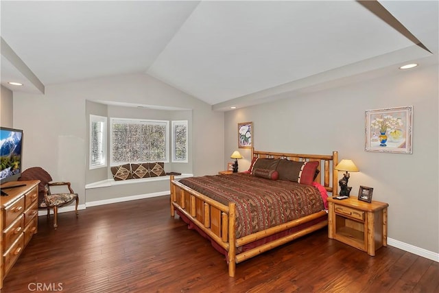 bedroom featuring dark wood-type flooring and lofted ceiling