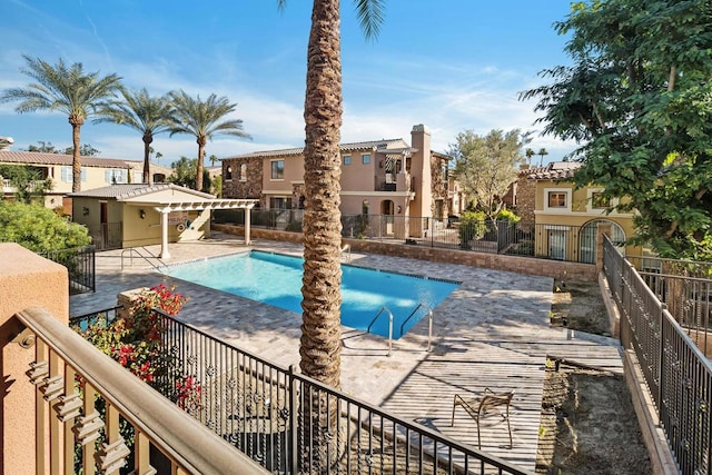 view of swimming pool with a patio