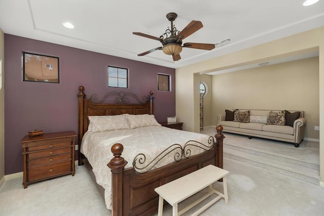 carpeted bedroom with ceiling fan