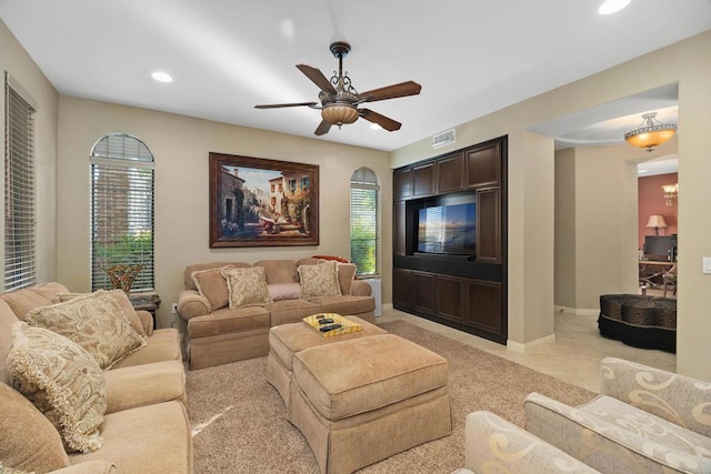 living room featuring ceiling fan